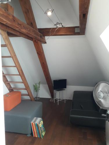 Χώρος καθιστικού στο Chambres chez Jean Luc