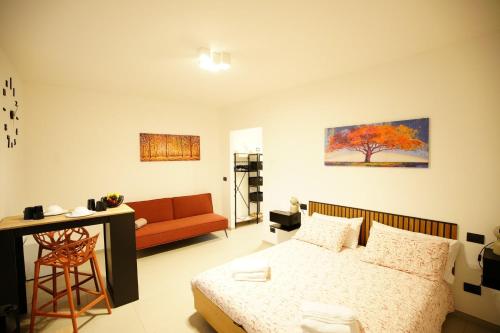Postel nebo postele na pokoji v ubytování The One Malpensa Rooms