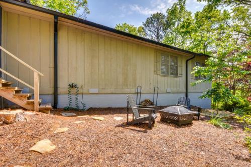 a house with a staircase and a bench in front of it at Deck and Game Room Mountaintop Hideaway in Tiger! in Tiger