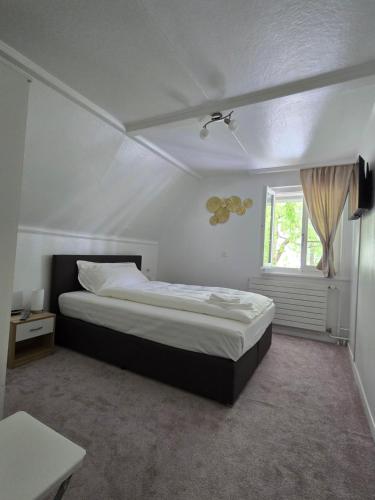 Una cama o camas en una habitación de B&B Al PONTE