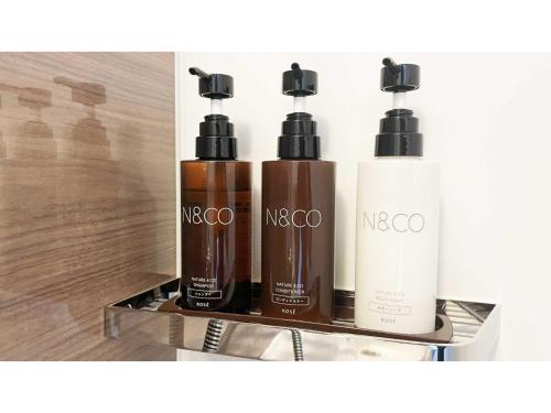 a group of three products sitting on a shelf at Sunnemu Hotel In Honjo - Vacation STAY 04605v in Yurihonjo