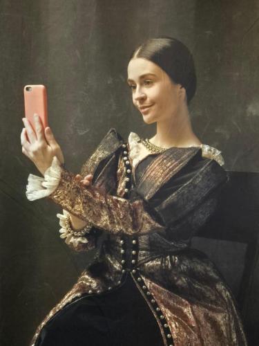 a painting of a woman holding a cell phone at Unique Shrewsbury Rooms in Shrewsbury