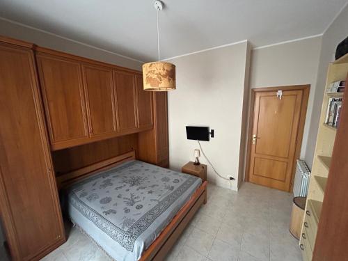 Postel nebo postele na pokoji v ubytování Appartamento fronte mare sulla riviera di ponente