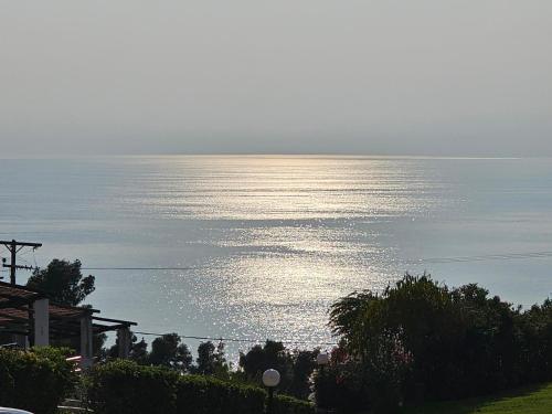a view of the ocean from a house at Aelia House Chalkidiki in Fourka
