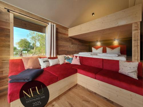 Katil atau katil-katil dalam bilik di WerderChalet -- SEABREEZE -- Meerblick I Strand 150m I Sauna I eKamin I 2 Personen und Kind I by "Meyers am Meer"