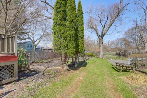 a park with a bench and trees and a fence at 1 Mi to Dtwn Schenectady Apt in Stockade District in Schenectady