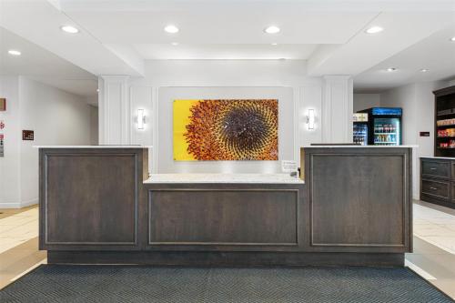 a lobby with a painting on the wall at Best Western Plus New Richmond Inn & Suites in New Richmond