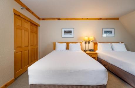 Ένα ή περισσότερα κρεβάτια σε δωμάτιο στο Selkirk Lodge
