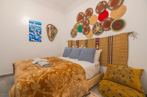 Una cama o camas en una habitación de L'authentique place