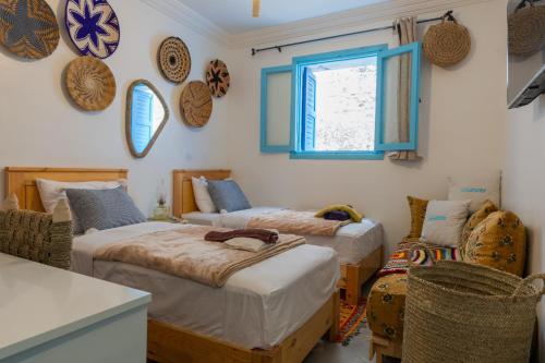 Una cama o camas en una habitación de L'authentique place