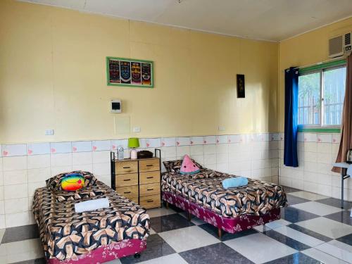Ένα ή περισσότερα κρεβάτια σε δωμάτιο στο Karanas Comfort Home Stay