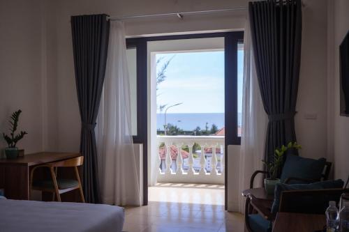 Ένα ή περισσότερα κρεβάτια σε δωμάτιο στο Farmer Community Hotel