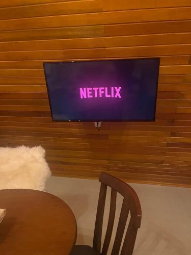 TV a/nebo společenská místnost v ubytování Chalés da Serra Urubici - Campestre