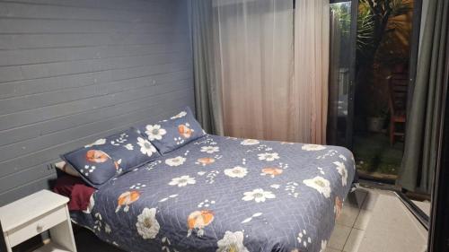 Una cama o camas en una habitación de Hostel INK - Duerme Como En Casa