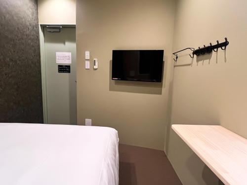 Hostel Hangoutにあるテレビまたはエンターテインメントセンター