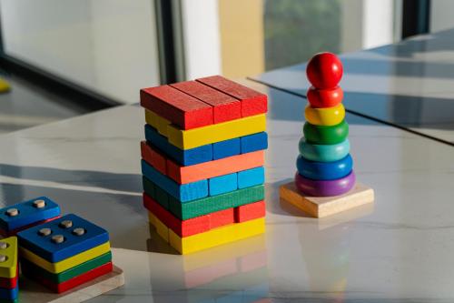 a stack of colored legos sitting on a table at Astica Hotel Nha trang in Nha Trang