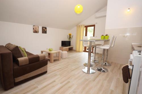 Χώρος καθιστικού στο Apartmani Mizdrak