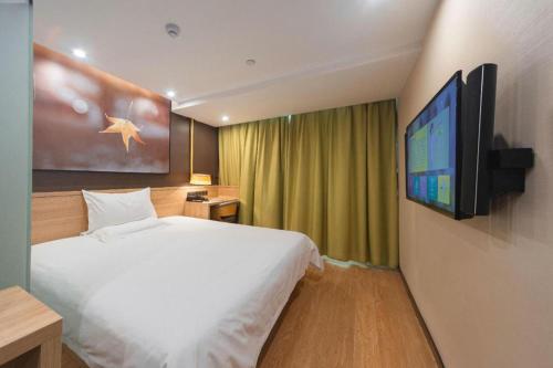 Μια τηλεόραση ή/και κέντρο ψυχαγωγίας στο IU Hotel Changsha Railway Station Branch