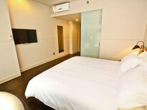 Cama o camas de una habitación en Jinjiang Inn Select Xi'an Hongmiaopo East Daxing Road