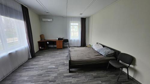 เตียงในห้องที่ Ventspils iela - Viesu Māja ar saunu
