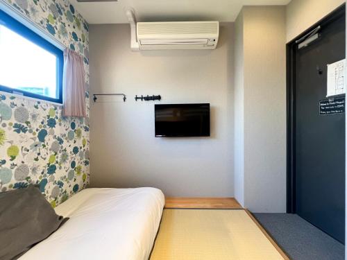 Hostel Hangoutにあるベッド