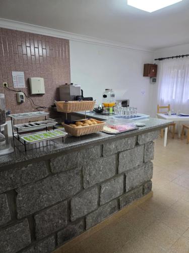 Η κουζίνα ή μικρή κουζίνα στο Serrana Gerês Inn