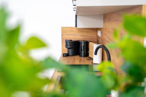 a coffee pot sitting on top of a counter at Cozy Main Square Apartment III with Breakfast in Košice