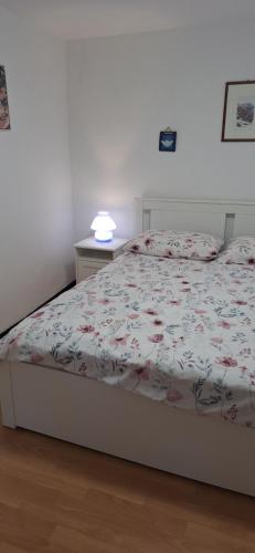 Posteľ alebo postele v izbe v ubytovaní Apartman Legac