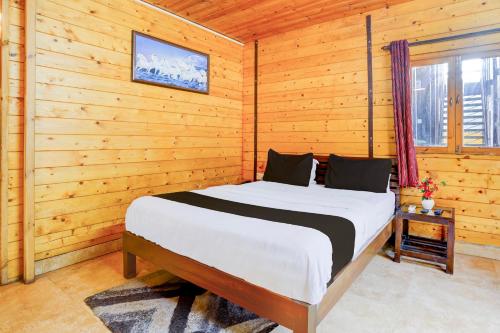 Postel nebo postele na pokoji v ubytování Super Townhouse Morjim
