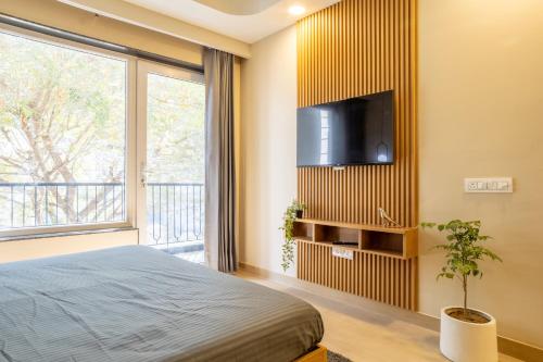 Ένα ή περισσότερα κρεβάτια σε δωμάτιο στο Housr 1 BHK Apartment Sector 42 Gurgaon Near Two Horizon Centre