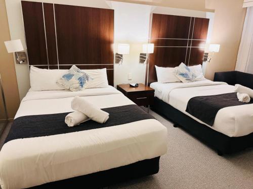 Voodi või voodid majutusasutuse Ocean with City Views, Level 17, 5G Internet At Mantra toas