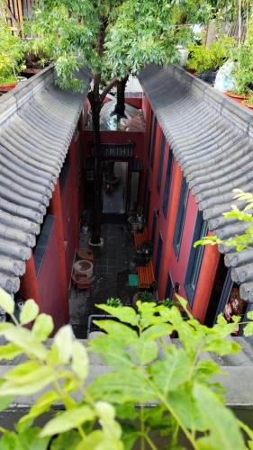 an overhead view of an alley with colorful buildings at YOYO PINKE Hotel in Beijing