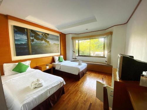 Katil atau katil-katil dalam bilik di Chiang Khan Boutique Hotel