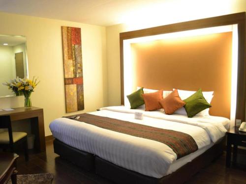 Katil atau katil-katil dalam bilik di The Ritz Hotel at Garden Oases