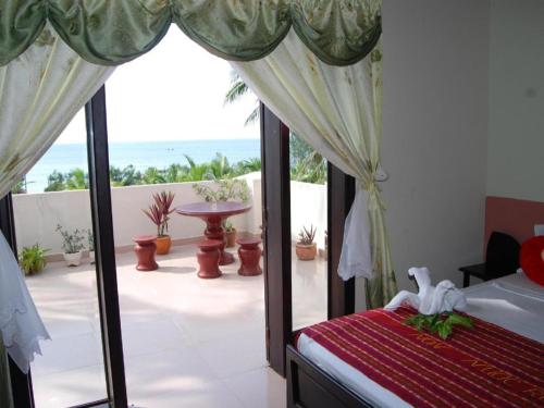 Postel nebo postele na pokoji v ubytování Non Nuoc Resort