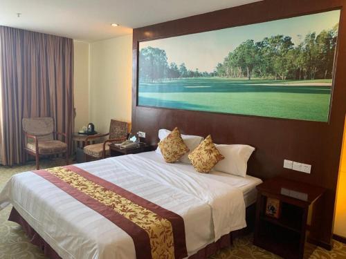 Postel nebo postele na pokoji v ubytování Zhaoqing Shanshui Fashion Hotel Duanzhou Road Branch
