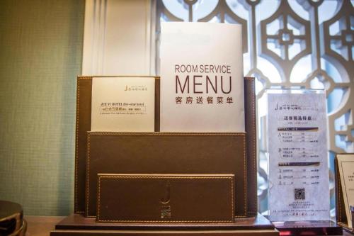 a brownence meu box sitting on top of a table at Xian Jue Vu Hotel in Xi'an