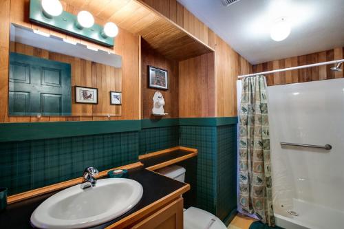a bathroom with a sink and a shower and a toilet at Mt Baker Rim Cabin #44 - Hot Tub- Pets Ok - Wifi in Glacier