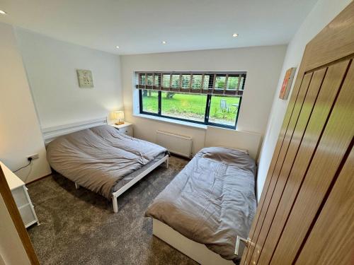 Ein Bett oder Betten in einem Zimmer der Unterkunft Severn View Barn