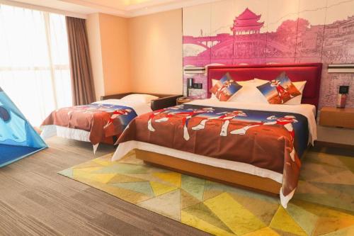 Postel nebo postele na pokoji v ubytování Hampton By Hilton ChangSha XingSha
