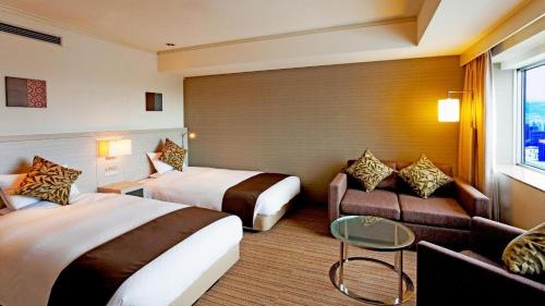 Un ou plusieurs lits dans un hébergement de l'établissement Century Royal Hotel Sapporo