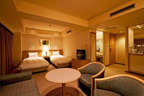 Télévision ou salle de divertissement dans l'établissement Century Royal Hotel Sapporo