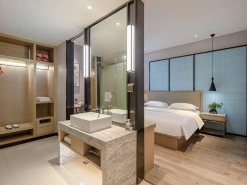 Ένα μπάνιο στο Echarm Hotel Baise Sports Center Dream Island Plaza