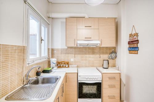 Kuchyň nebo kuchyňský kout v ubytování Alt Cozy Apartment in Chios
