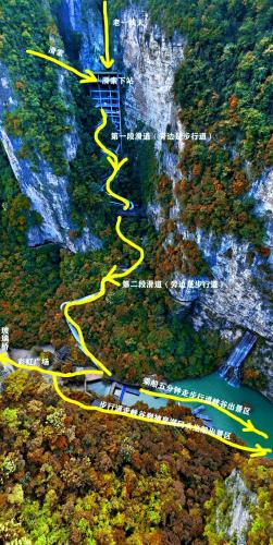 a road with a yellow line on a mountain at 笑涡SmileNest Downtown Luxury Suite for 2-10 Guests, Zhangjiajie Attraction Ticket Service, Ideal for Couples, Families & Groups in Zhangjiajie