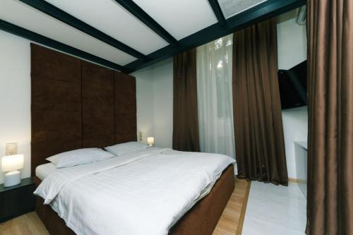 En eller flere senge i et værelse på Лофт на Майдані Крещатик