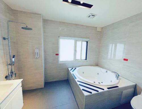 Vannituba majutusasutuses Walker Hotel - Sanchong