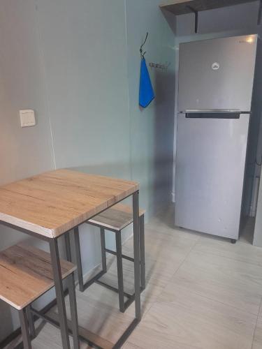 Kuchyň nebo kuchyňský kout v ubytování One-bedroom beach apartment, aircon,pool,WIFI
