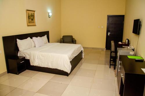 Postel nebo postele na pokoji v ubytování Fabian Hotel Ado-Ekiti