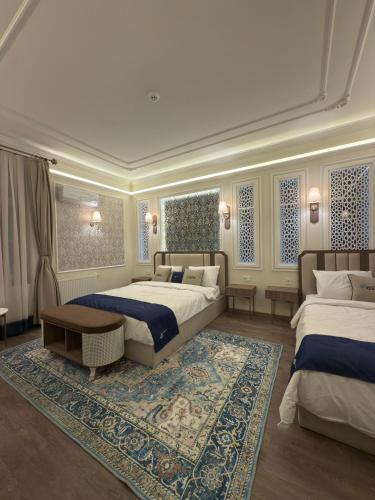 Posteľ alebo postele v izbe v ubytovaní Oasis Inn Budapest